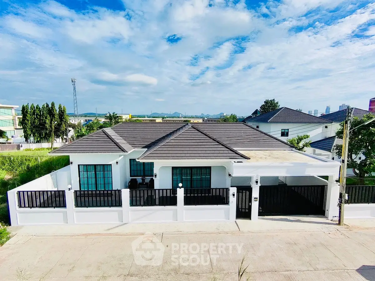 Charming modern bungalow with sleek design and spacious yard in a serene neighborhood.