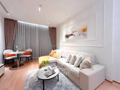 Elegant living room with modern decor and cozy seating area