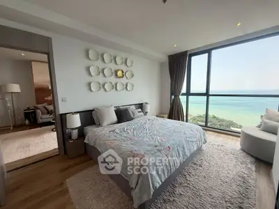 Luxurious bedroom with stunning ocean view and modern decor