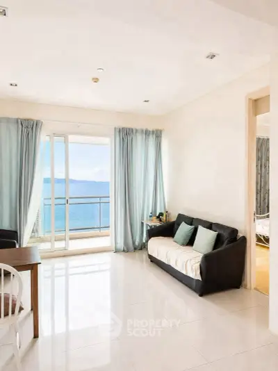 Spacious living room with ocean view and elegant decor