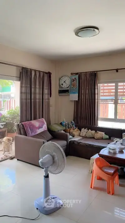 Cozy living room with modern decor and natural light