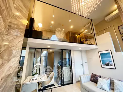 Luxurious modern loft apartment with high ceilings and elegant chandelier