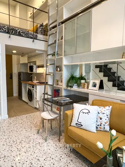 Modern loft apartment with stylish decor and mezzanine level