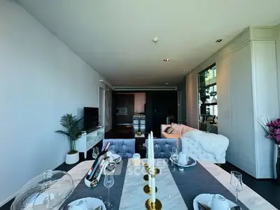 Luxurious living room with elegant dining setup and modern decor