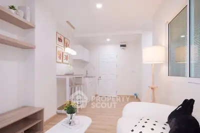 Modern living room with open kitchen and stylish decor