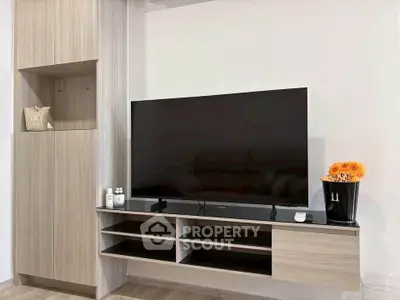 Modern living room with sleek TV unit and stylish decor