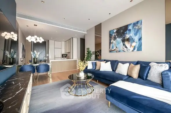 Luxurious modern living room with elegant blue sofa and stylish decor