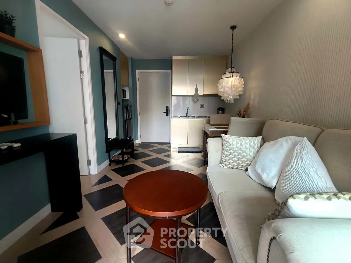 Stylish modern living room with chic decor and open kitchen layout
