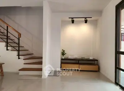 Modern interior with sleek staircase and minimalist decor