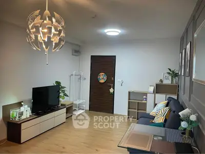 Modern living room with stylish lighting and cozy decor
