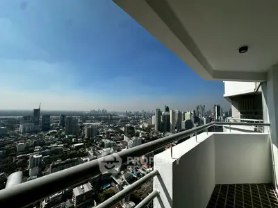 Stunning cityscape view from a high-rise balcony, perfect for urban living enthusiasts.