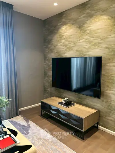 Modern living room with stylish TV setup and elegant decor