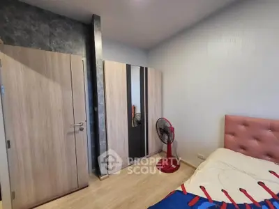 Cozy bedroom with modern wardrobe and stylish decor