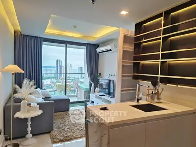 Modern living room with city view, stylish furniture, and open kitchen layout in high-rise apartment.