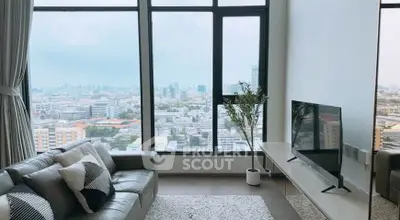 Modern living room with panoramic city view and stylish decor