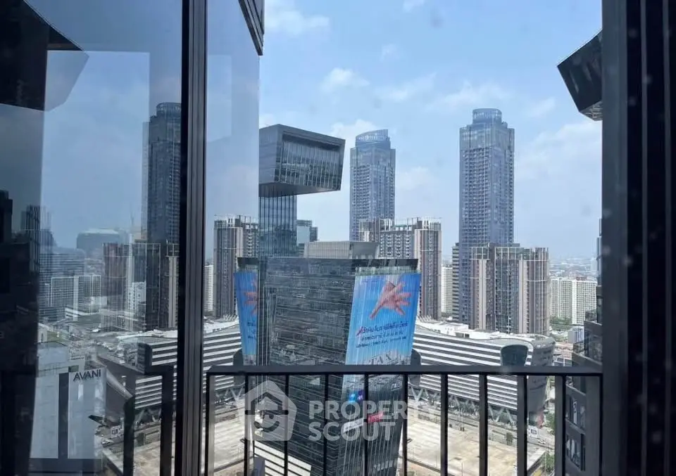 Stunning cityscape view from a modern high-rise balcony, showcasing urban architecture and skyline.