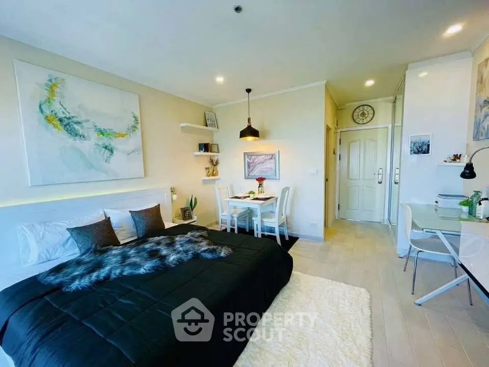 Modern studio apartment with stylish decor and cozy ambiance