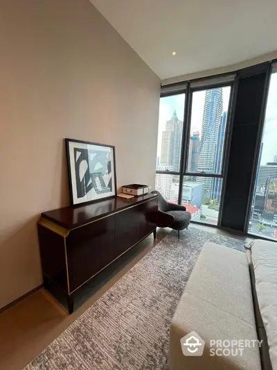 Modern bedroom with city view, stylish furniture, and large windows in urban apartment.