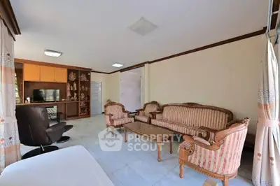 Spacious living room with elegant furniture and natural light