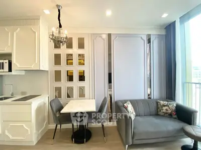 Elegant living room with chic decor and modern kitchen in open layout apartment