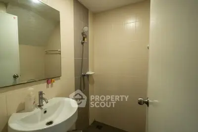 Modern bathroom with shower and sink in minimalist design