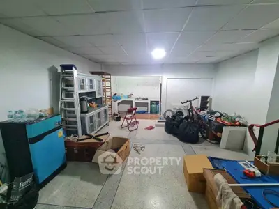 Spacious storage room with various items and bicycles, ideal for organizing and storing belongings.