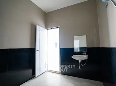 Spacious modern bathroom with sleek design and natural light