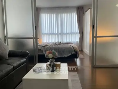 Modern studio apartment with cozy bedroom and stylish living area