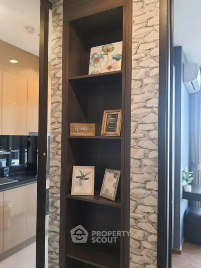 Modern kitchen with stylish shelving and decorative accents