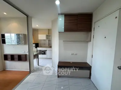 Modern apartment interior with sleek kitchen and stylish storage solutions