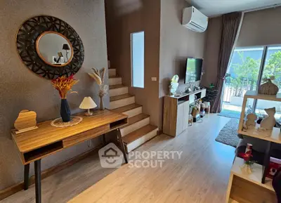 Stylish modern living room with wooden flooring and elegant decor