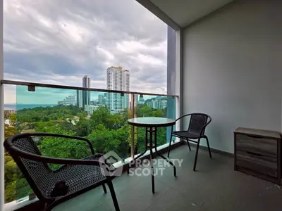 Stunning balcony with panoramic city and greenery views, perfect for relaxation.