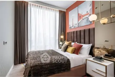 Luxurious modern bedroom with elegant decor and large window