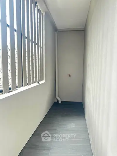 Spacious balcony with modern design and ample natural light
