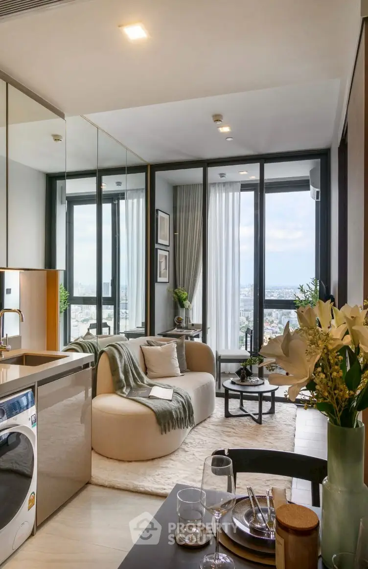 Modern living room with panoramic city view, stylish decor, and open kitchen layout in luxury apartment.