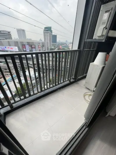 Modern balcony with city view in high-rise apartment