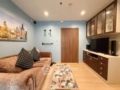 Cozy living room with plush sofa and modern entertainment unit