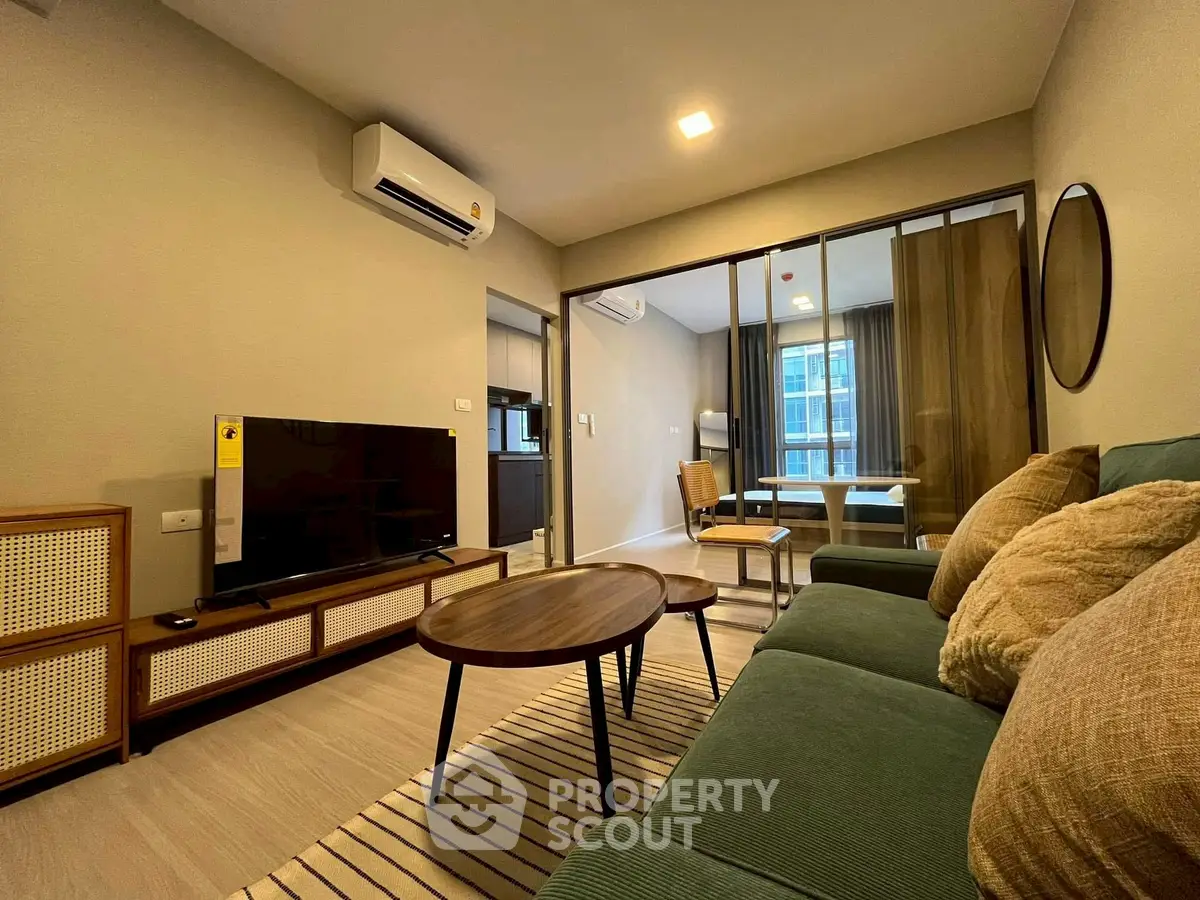Modern living room with stylish furniture and open layout in a contemporary apartment.
