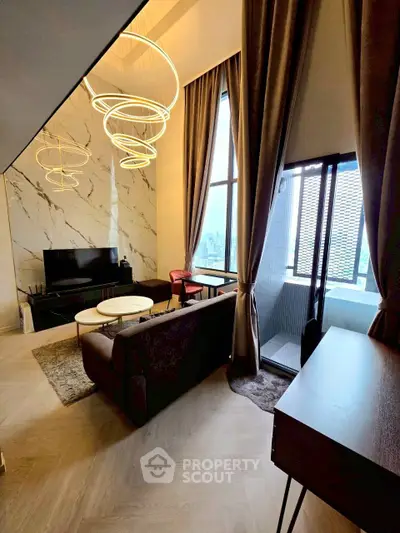 Luxurious living room with high ceilings, modern lighting, and city view balcony.