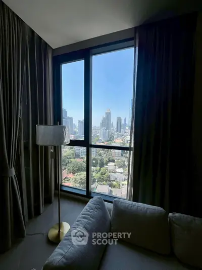 Luxurious living room with stunning city view through large windows
