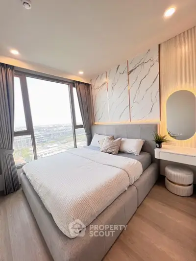 Luxurious bedroom with panoramic city view and modern decor