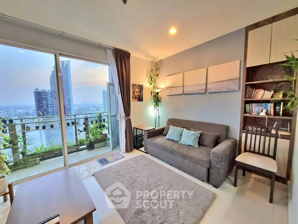 Modern living room with balcony view in high-rise apartment
