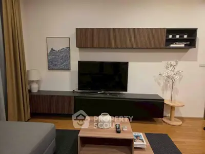 Modern living room with stylish furniture and wall-mounted TV unit, perfect for cozy evenings.