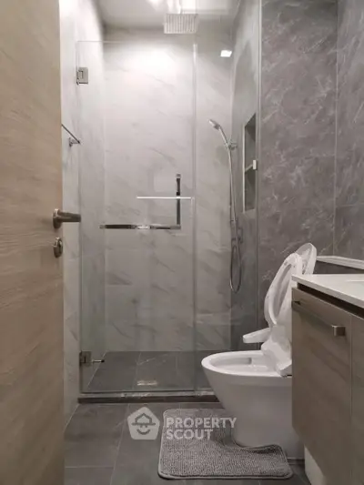 Modern bathroom with glass shower and sleek design