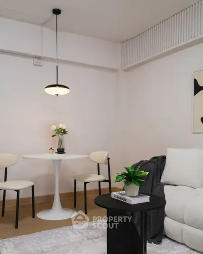 Modern living room with stylish furniture and elegant decor