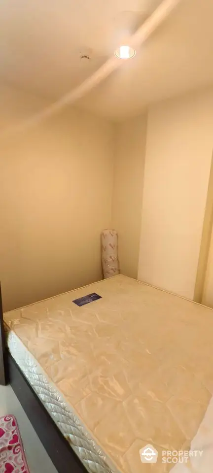 Cozy bedroom with comfortable mattress in compact space