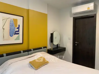 Cozy bedroom with modern decor and air conditioning