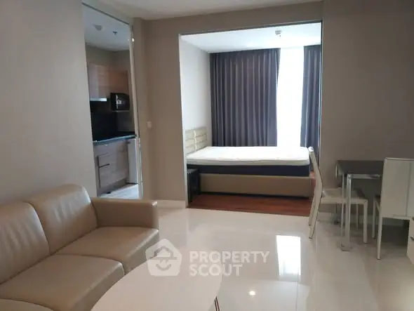 Modern studio apartment with open layout and sleek furnishings