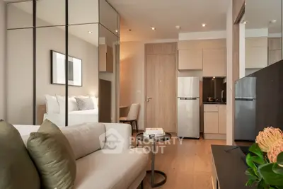 Modern studio apartment with sleek design and cozy ambiance