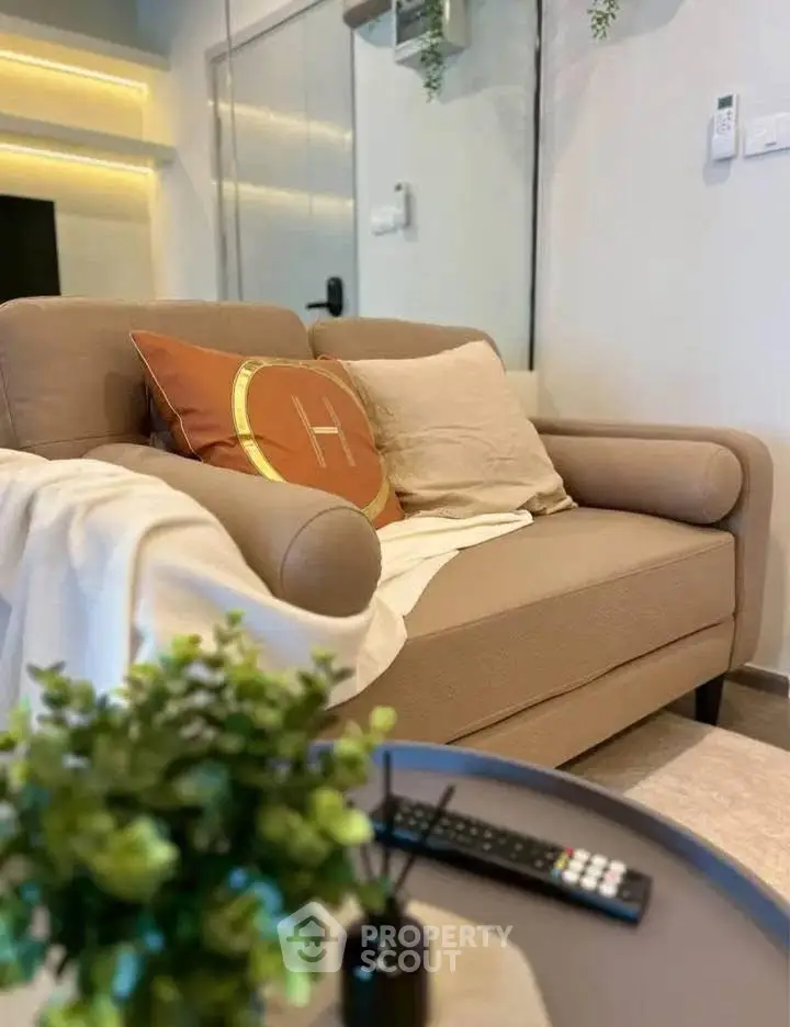 Cozy living room with stylish sofa and modern decor